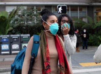 As COVID Variants Surge Again, Office Workers Urged to Stay Vigilant